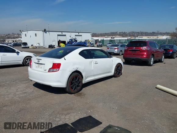 2012 Scion tC with VIN JTKJF5C7XC3029980, listed as a IAAI auction lot 41832490 with 132,140 mi miles. Bid and sale history available at carsss.com. Image 4.