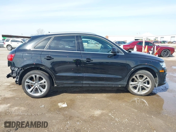 2016 Audi Q3 Premium Plus with VIN WA1EFCFS9GR018740, listed as a IAAI auction lot 41564117 with 38,303 mi miles. Bid and sale history available at carsss.com. Image 14.