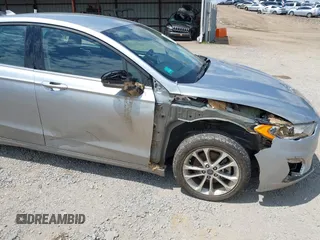 2020 Ford Fusion SE with VIN 3FA6P0LU4LR212740, listed as a IAAI auction lot 42374044 with 146,927 mi miles and . Bid and sale history available at DreamBid. Image 6.
