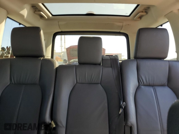 2012 Land Rover LR4 HSE with VIN SALAG2D43CA633785, listed as a Copart auction lot 77617344 with 103,894 mi miles and Salvage Title. Bid and sale history available at DreamBid. Image 10.