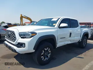 2023 Toyota Tacoma SR with VIN 3TMCZ5AN7PM630874, listed as a IAAI auction lot 40298041 with 8,635 mi miles and . Bid and sale history available at DreamBid. Image 17.