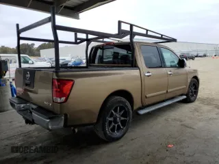 2004 Nissan Titan LE with VIN 1N6AA07A54N554415, listed as a Copart auction lot 54571635 with 196,664 mi miles and Clean Title. Bid and sale history available at DreamBid. Image 3.