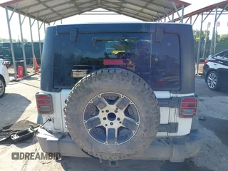 2016 Jeep Wrangler Unlimited Sport z VIN 1C4BJWDG5GL257423, wystawiony jako IAAI lot #42530026 z przebiegiem 157 072 mil mil oraz . Historia ofert i sprzedaży dostępna na DreamBid. Obrazek 16.