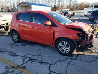 2013 Chevrolet Sonic LT with VIN 1G1JC6SB2D4228540, listed as a Copart auction lot 85100394 with 95,613 mi miles and Salvage Title. Bid and sale history available at carsss.com. Image 4.