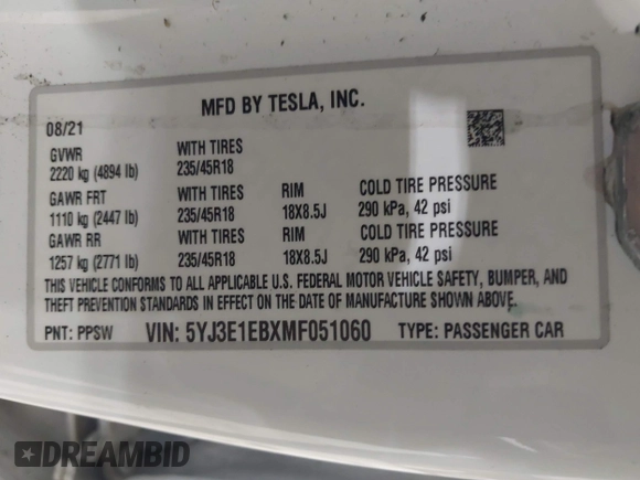2021 Tesla Model 3 Long Range with VIN 5YJ3E1EBXMF051060, listed as a IAAI auction lot 41958018 with 65,631 mi miles. Bid and sale history available at carsss.com. Image 9.