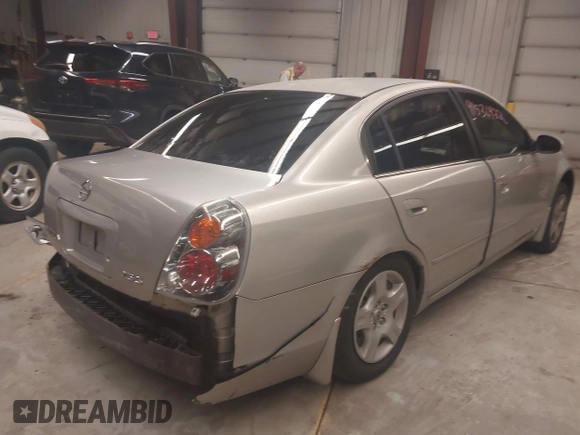 2004 Nissan Altima S with VIN 1N4AL11D14C119642, listed as a IAAI auction lot 41530422 with 98,613 mi miles. Bid and sale history available at carsss.com. Image 4.