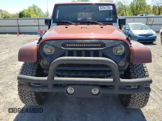 2010 Jeep Wrangler Unlimited Sahara with VIN 1J4BA5H11AL107228, listed as a Copart auction lot 54761705 with 102,816 mi miles and Clean Title. Bid and sale history available at carsss.com. Image 5.