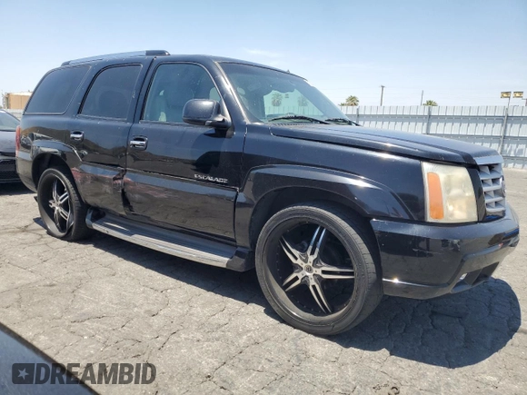 2002 Cadillac Escalade z VIN 1GYEC63T42R189976, wystawiony jako Copart lot #57852565 z przebiegiem 243 089 mil mil oraz Szkody całkowita. Historia ofert i sprzedaży dostępna na DreamBid. Obrazek 4.