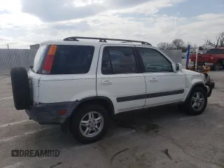 1999 Honda CR-V EX with VIN JHLRD1868XC017277, listed as a Copart auction lot 50507545 with 323,379 mi miles and Salvage Title. Bid and sale history available at carsss.com. Image 3.