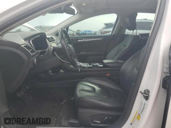2013 Ford Fusion Titanium Hybrid с VIN 3FA6P0RU3DR282013, выставлен на аукционе Copart как лот 53651595 с пробегом 133 214 миль миль и Списание • Salvage title. История ставок и продаж доступна на DreamBid. Изображение 7.