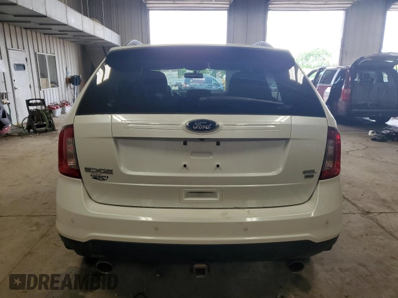 2014 Ford Edge SEL z VIN 2FMDK4JC9EBB53117, wystawiony jako Copart lot #61017115 z przebiegiem 118 071 mil mil oraz Nie do naprawy • Non repairable. Historia ofert i sprzedaży dostępna na DreamBid. Obrazek 6.