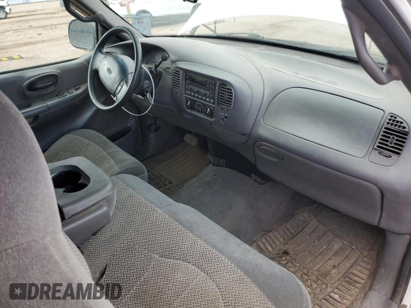 2000 Ford F-150 XL z VIN 1FTRX17W7YNC12430, wystawiony jako Copart lot #66036385 z przebiegiem Nie podano mil oraz Nie do naprawy • Non repairable. Historia ofert i sprzedaży dostępna na DreamBid. Obrazek 8.