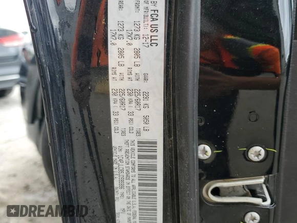 2018 Jeep Cherokee Latitude with VIN 1C4PJLCB5JD595996, listed as a Copart auction lot 57868775 with 135,431 mi miles and Salvage title. Bid and sale history available at DreamBid. Image 13.