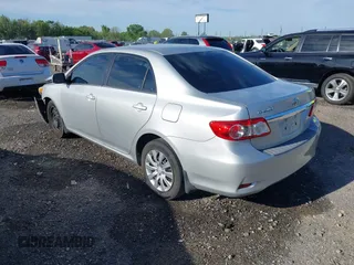 2013 Toyota Corolla L with VIN 5YFBU4EE7DP166021, listed as a IAAI auction lot 42027062 with 179,107 mi miles and . Bid and sale history available at DreamBid. Image 3.