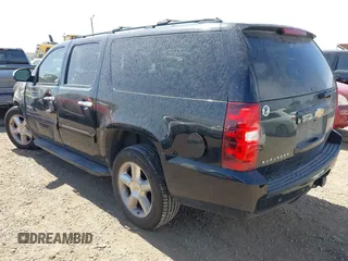 2012 Chevrolet Suburban LS with VIN 1GNSCHE03CR241355, listed as a IAAI auction lot 41791615 with 214,964 mi miles. Bid and sale history available at carsss.com. Image 3.