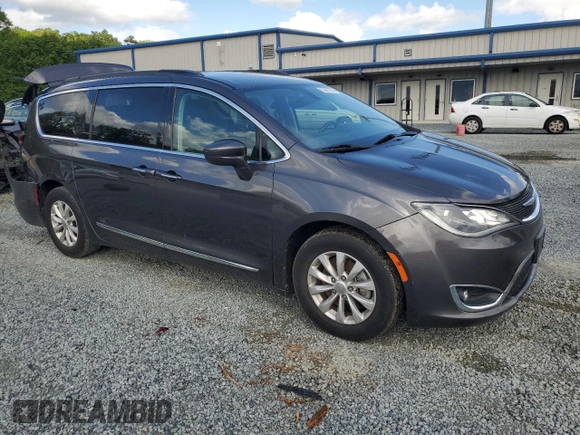 2017 Chrysler Pacifica Touring L with VIN 2C4RC1BG3HR576178, listed as a Copart auction lot 52801685 with 151,904 mi miles and Salvage Title. Bid and sale history available at DreamBid. Image 4.
