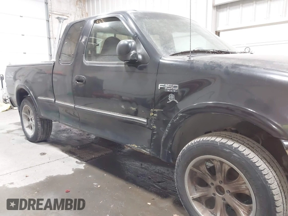 1997 Ford F-150 XL with VIN 1FTDX18W6VNB19712, listed as a IAAI auction lot 41740832 with 232,275 mi miles. Bid and sale history available at carsss.com. Image 6.