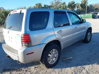 2005 Mercury Mariner Luxury with VIN 4M2CU57115DJ11387, listed as a IAAI auction lot 41267614 with 166,448 mi miles. Bid and sale history available at carsss.com. Image 4.