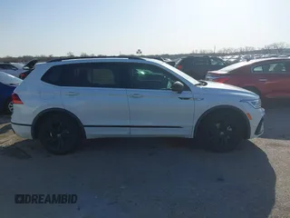 2024 Volkswagen Tiguan SE R-Line Black with VIN 3VVCB7AX0RM099863, listed as a IAAI auction lot 41851884 with 14,091 mi miles and . Bid and sale history available at DreamBid. Image 13.