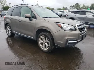 2018 Subaru Forester Touring z VIN JF2SJAWC9JH549911, wystawiony jako Copart lot #58152385 z przebiegiem 91 787 mil mil oraz Szkoda całkowita • Salvage title. Historia ofert i sprzedaży dostępna na DreamBid. Obrazek 4.