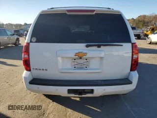 2013 Chevrolet Tahoe LS with VIN 1GNSCAE09DR340125, listed as a Copart auction lot 82894734 with 214,909 mi miles and Salvage title. Bid and sale history available at DreamBid. Image 6.