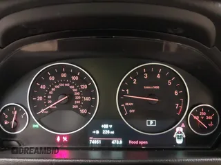 2015 BMW 4 Series 428i xDrive with VIN WBA3T1C52FP821020, listed as a IAAI auction lot 42004707 with 74,951 mi miles and . Bid and sale history available at carsss.com. Image 7.