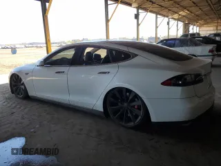 2013 Tesla Model S с VIN 5YJSA1DG5DFP03667, выставлен на аукционе Copart как лот 50607605 с пробегом 87 146 миль миль и Чистый • Clean title. История ставок и продаж доступна на DreamBid. Изображение 2.