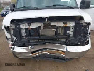 2013 Ford Econoline Cargo Commercial with VIN 1FTNE2EW9DDA82065, listed as a IAAI auction lot 42073299 with 259,758 mi miles and . Bid and sale history available at DreamBid. Image 6.