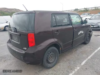 2009 Scion xB with VIN JTLKE50E291081243, listed as a IAAI auction lot 42033327 with 263,903 mi miles. Bid and sale history available at carsss.com. Image 4.