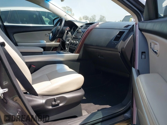 2015 Mazda CX-9 Grand Touring with VIN JM3TB3DA0F0459024, listed as a IAAI auction lot 42452288 with 174,716 mi miles and . Bid and sale history available at DreamBid. Image 5.