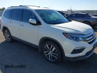 2017 Honda Pilot Elite with VIN 5FNYF6H02HB042160, listed as a IAAI auction lot 40893685 with Not Provided miles and . Bid and sale history available at DreamBid. Image 1.