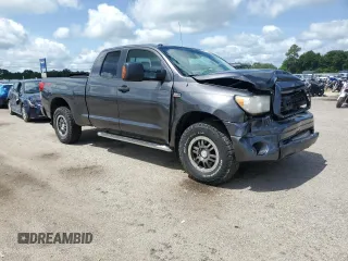 2011 Toyota Tundra 4WD Truck with VIN 5TFUY5F14BX168936, listed as a Copart auction lot 64460524 with 166,212 mi miles and Salvage Title. Bid and sale history available at carsss.com. Image 4.
