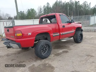 1999 Chevrolet Silverado 1500 LS with VIN 1GCEK14T4XZ200041, listed as a IAAI auction lot 41475530 with 228,939 mi miles. Bid and sale history available at carsss.com. Image 4.