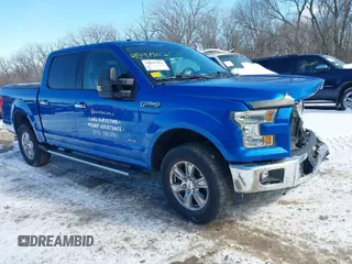 2015 Ford F-150 XLT with VIN 1FTEW1EG1FFA87638, listed as a IAAI auction lot 41597302 with 143,400 mi miles. Bid and sale history available at carsss.com. Image 1.
