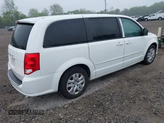 2015 Dodge Grand Caravan SE with VIN 2C4RDGBG2FR606610, listed as a IAAI auction lot 42197738 with 144,620 mi miles and . Bid and sale history available at DreamBid. Image 4.