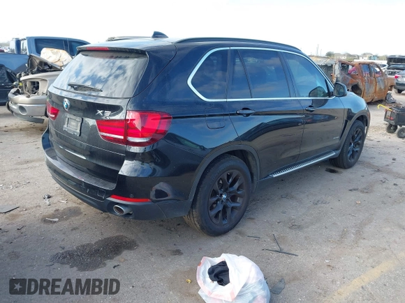 2014 BMW X5 xDrive35d with VIN 5UXKS4C5XE0J95127, listed as a IAAI auction lot 41755847 with 145,539 mi miles. Bid and sale history available at carsss.com. Image 4.