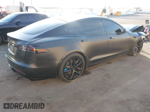 2022 Tesla Model S with VIN 5YJSA1E57NF493457, listed as a IAAI auction lot 41456284 with Not Provided miles and . Bid and sale history available at DreamBid. Image 4.
