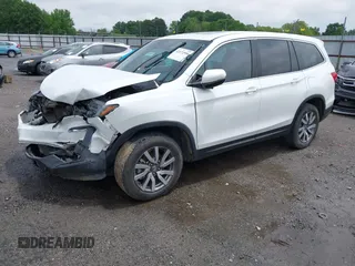 2020 Honda Pilot EX-L z VIN 5FNYF6H57LB067852, wystawiony jako IAAI lot #42172590 z przebiegiem 109 026 mil mil oraz . Historia ofert i sprzedaży dostępna na DreamBid. Obrazek 2.