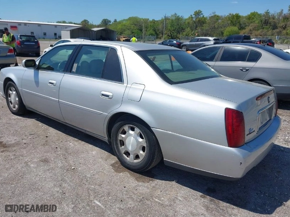 2001 Cadillac DeVille with VIN 1G6KD54Y91U235374, listed as a IAAI auction lot 41874980 with 136,090 mi miles. Bid and sale history available at carsss.com. Image 3.