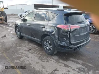 2016 Toyota RAV4 LE with VIN JTMZFREV5GJ097330, listed as a IAAI auction lot 41884397 with 107,699 mi miles. Bid and sale history available at carsss.com. Image 3.