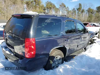 2009 GMC Yukon SLT w/4SB with VIN 1GKFK33059R146280, listed as a Copart auction lot 87421444 with 118,566 mi miles and Salvage Title. Bid and sale history available at carsss.com. Image 3.