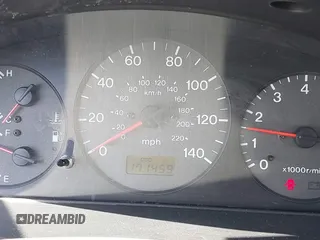 1999 Mazda Protege DX z VIN JM1BJ2228X0108327, wystawiony jako IAAI lot #41630708 z przebiegiem 171 459 mil mil oraz . Historia ofert i sprzedaży dostępna na DreamBid. Obrazek 7.