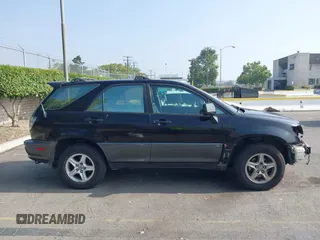 2001 Lexus RX 300 z VIN JTJHF10UX10181150, wystawiony jako IAAI lot #42474131 z przebiegiem 143 047 mil mil oraz . Historia ofert i sprzedaży dostępna na DreamBid. Obrazek 14.