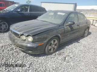 2002 Jaguar X-Type z VIN SAJEA51C02WC53526, wystawiony jako Copart lot #53761265 z przebiegiem 156 584 mil mil oraz Czysty tytuł • Clean title. Historia ofert i sprzedaży dostępna na DreamBid. Obrazek 1.