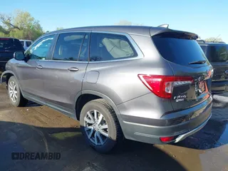 2019 Honda Pilot EX-L with VIN 5FNYF6H54KB038176, listed as a IAAI auction lot 42039560 with 52,404 mi miles and . Bid and sale history available at carsss.com. Image 3.