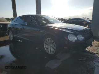 2014 Bentley Flying Spur z VIN SCBEC9ZA2EC090466, wystawiony jako Copart lot #43833305 z przebiegiem 53 837 mil mil oraz Szkody całkowita. Historia ofert i sprzedaży dostępna na DreamBid. Obrazek 4.