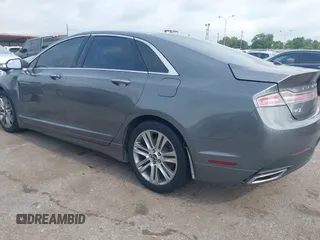 2014 Lincoln MKZ z VIN 3LN6L2GK3ER807586, wystawiony jako IAAI lot #42426125 z przebiegiem 198 281 mil mil oraz . Historia ofert i sprzedaży dostępna na DreamBid. Obrazek 3.