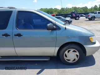 1999 Toyota Sienna LE z VIN 4T3ZF13C4XU118561, wystawiony jako IAAI lot #42536325 z przebiegiem 273 336 mil mil oraz . Historia ofert i sprzedaży dostępna na DreamBid. Obrazek 6.