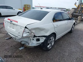 2011 Ford Fusion SE with VIN 3FAHP0HG3BR140455, listed as a IAAI auction lot 42020910 with 90,916 mi miles. Bid and sale history available at carsss.com. Image 4.