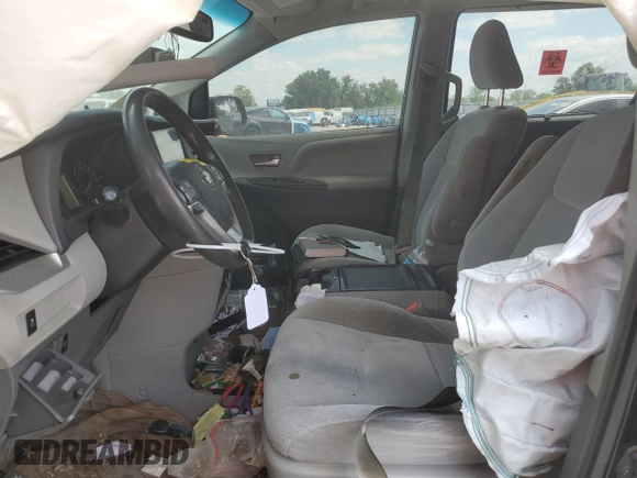 2015 Toyota Sienna LE AAS with VIN 5TDKK3DC3FS653209, listed as a Copart auction lot 54242095 with 228,634 mi miles and Salvage Title. Bid and sale history available at DreamBid. Image 7.
